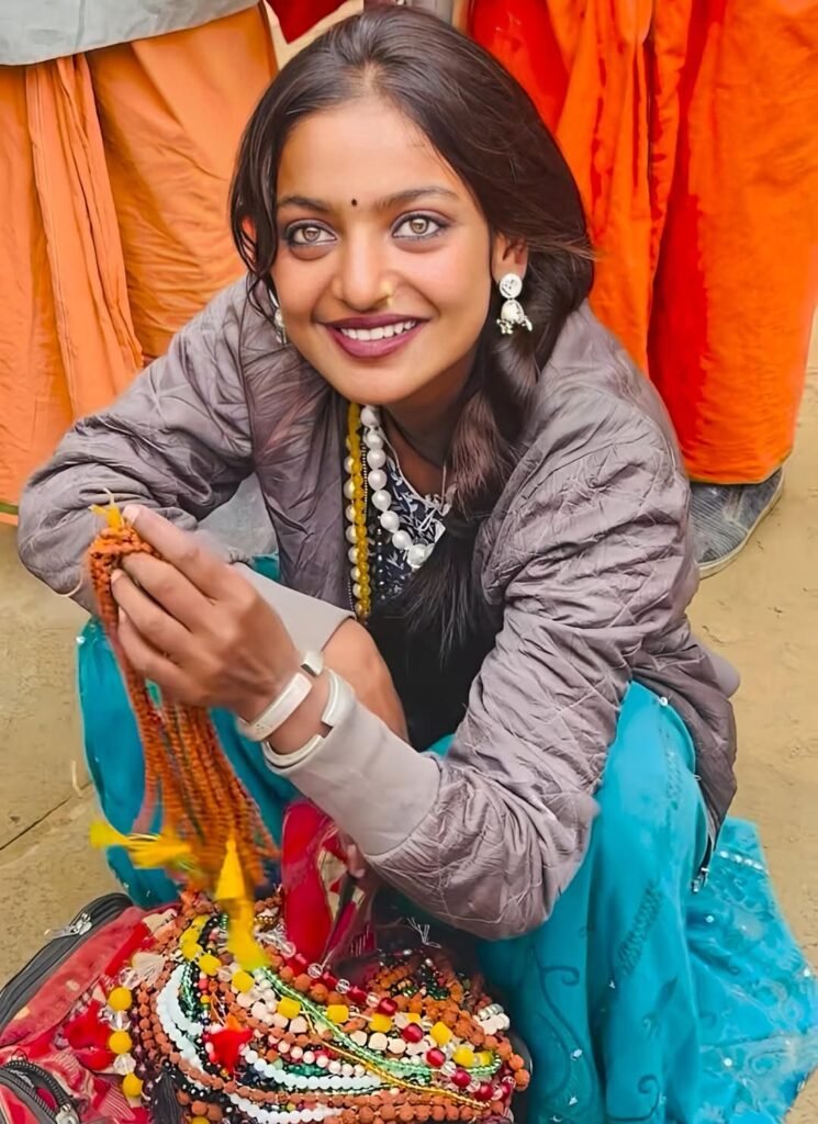 simple girl selling garlands at the Mahakumbh fair who unexpectedly became a media sensation.