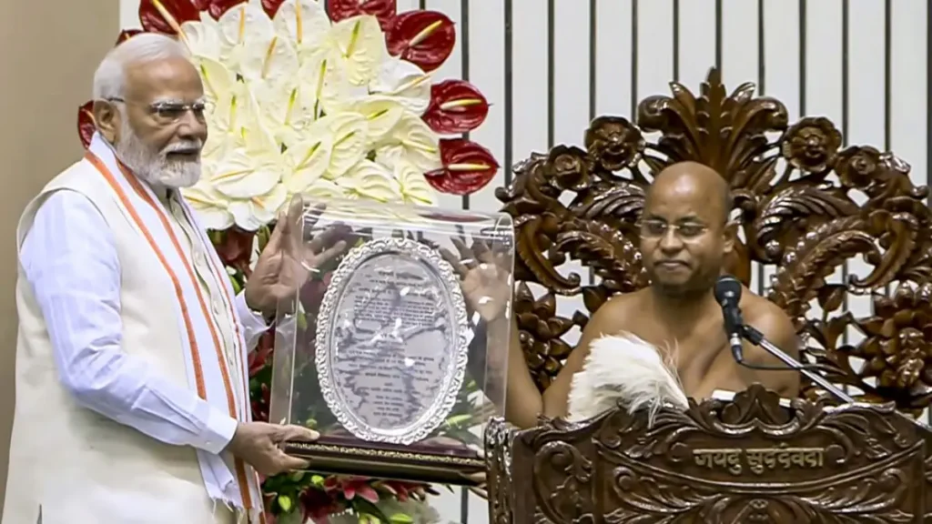 pm-modi-releases-stamp-and-coin-on-acharya-vidyanand-centenary